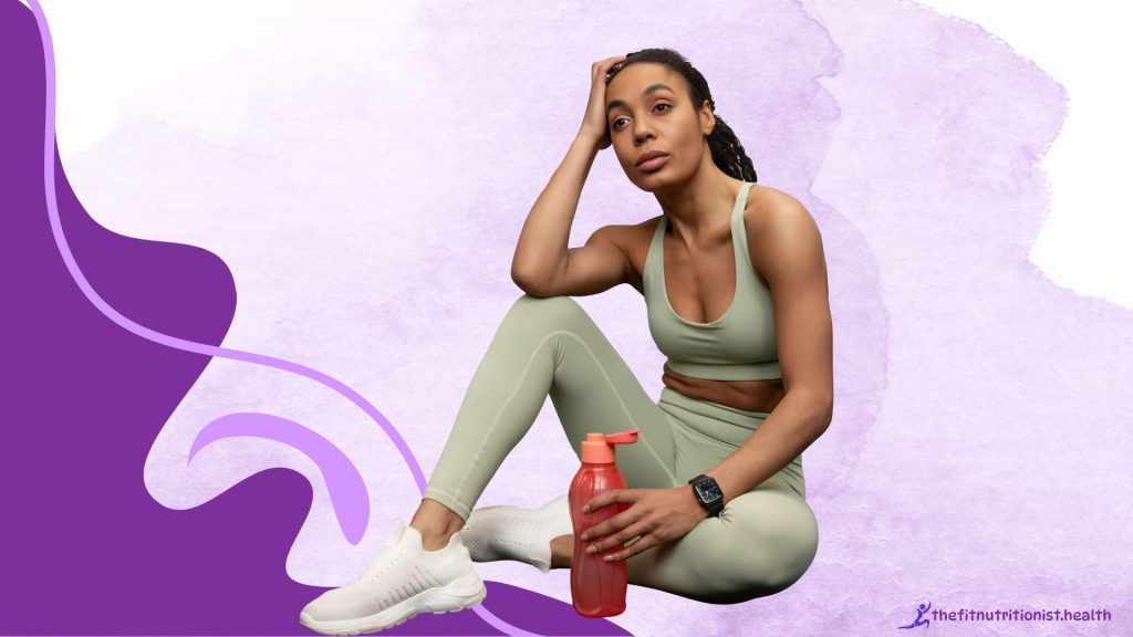 exercise schedule for gym beginners, image, woman sitting wearing a green gym outfit