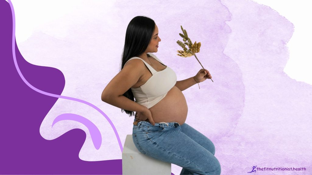 Postpartum Fitness Trainer, pregnant woman holding a flower